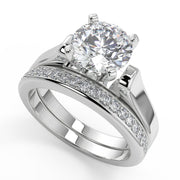 Rebekah 4 Prong Cathedral Solitaire Round Cut Engagement Ring - Nivetta